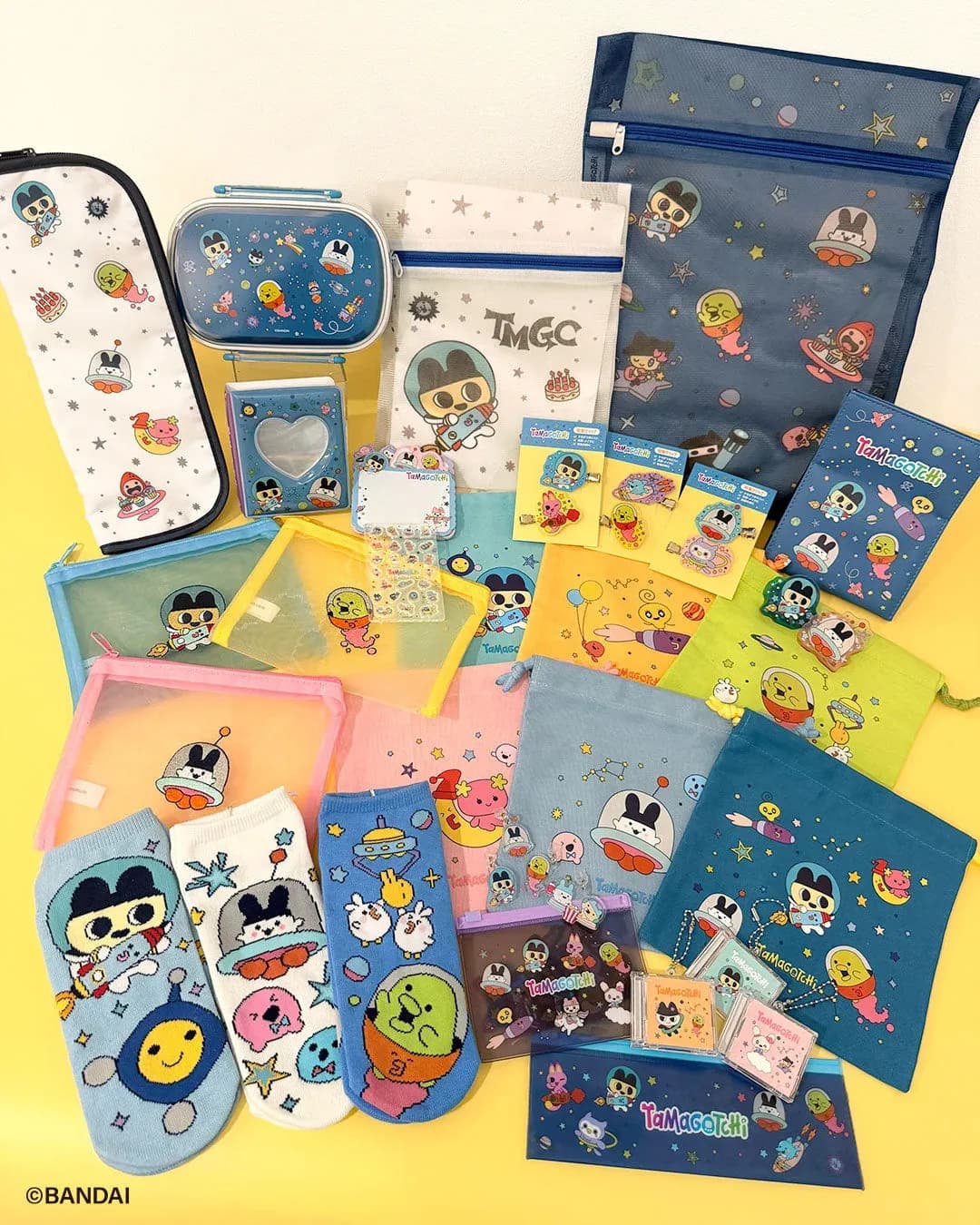 Thank You Mart Tamagotchi 30th anniversary goods, including pouches, socks, a lunch box and keychains